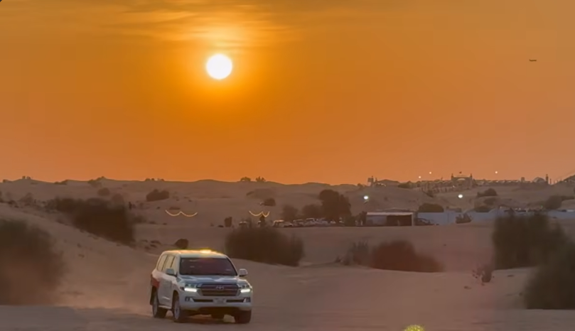 Evening desert safari Abu Dhabi price - 4x4 vehicle at sunset